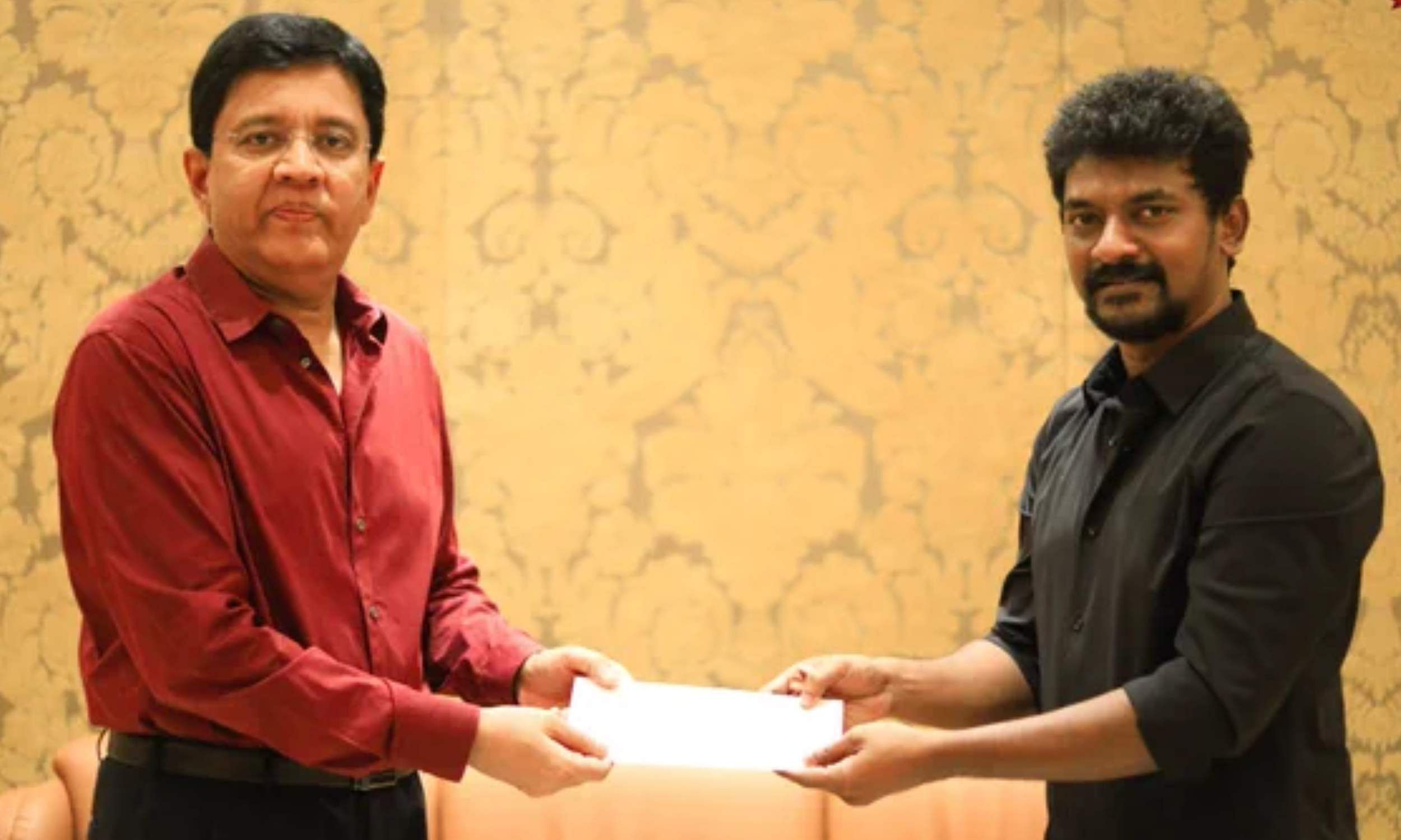 Kalanithi Maran gifts cheque to Nelson Dilipkumar after Jailer's success
